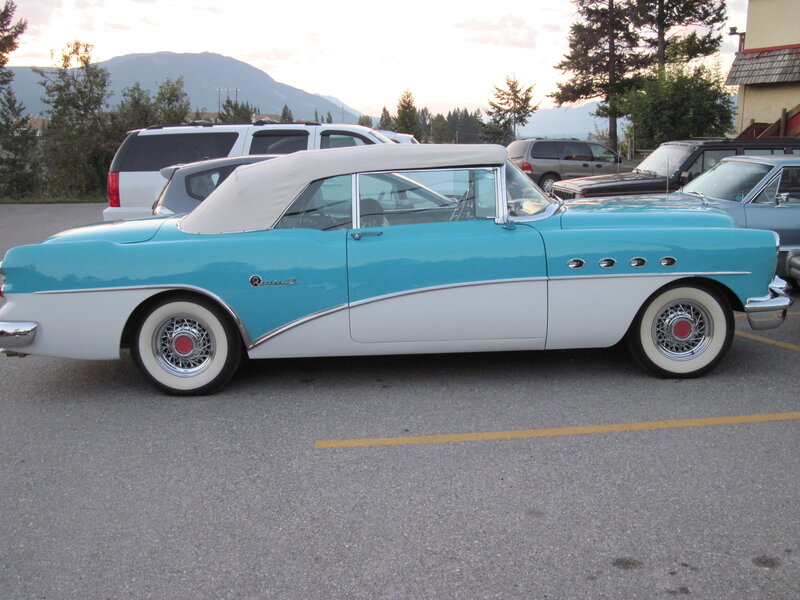 Light Blue Convertible Car — Serene, Sunset