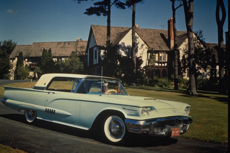 Light-blue Convertible Car — White