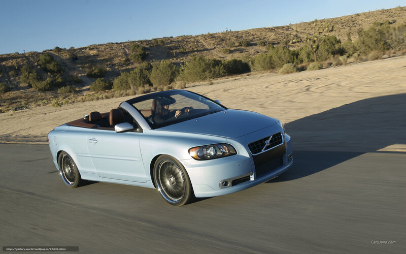 Light blue convertible driving