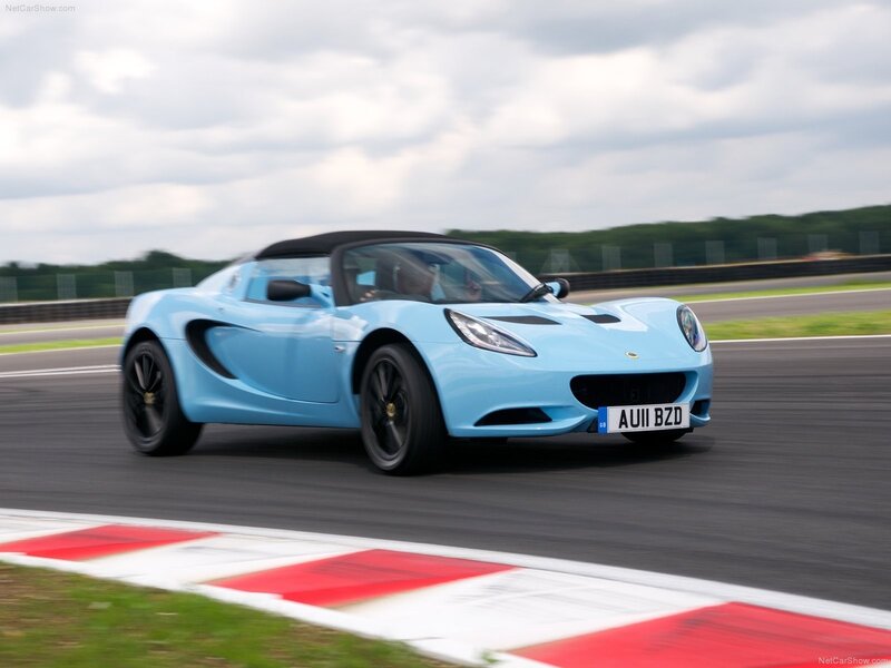 Light blue Lotus Elise on a racetrack