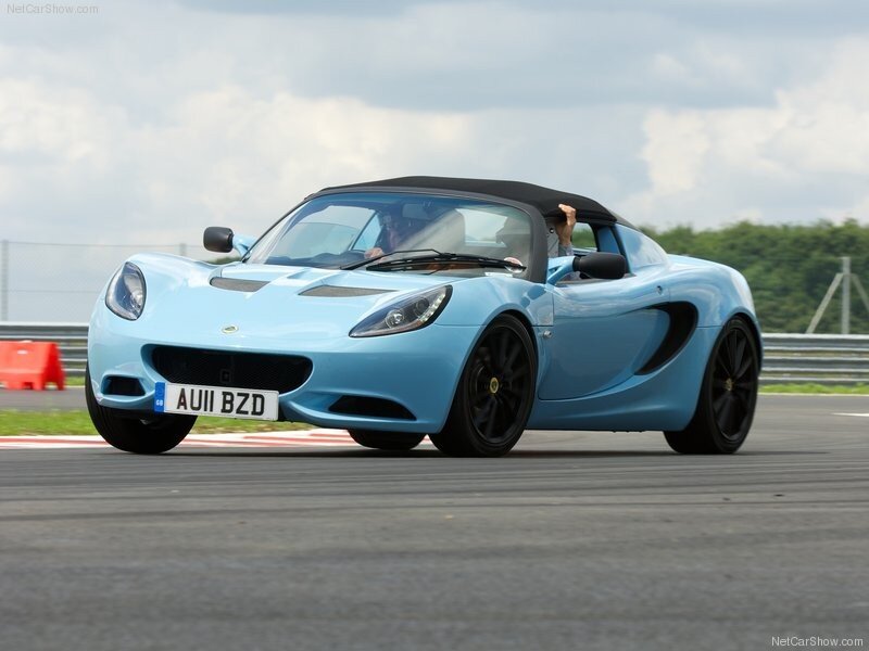 Light blue Lotus Elise on a racetrack