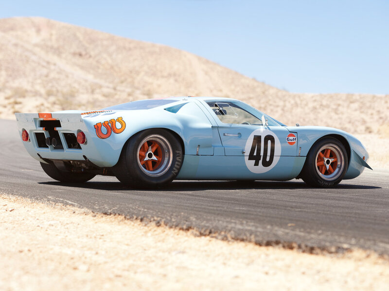 Light-blue Race Car — Blue, Dynamic, Afternoon, Photograph