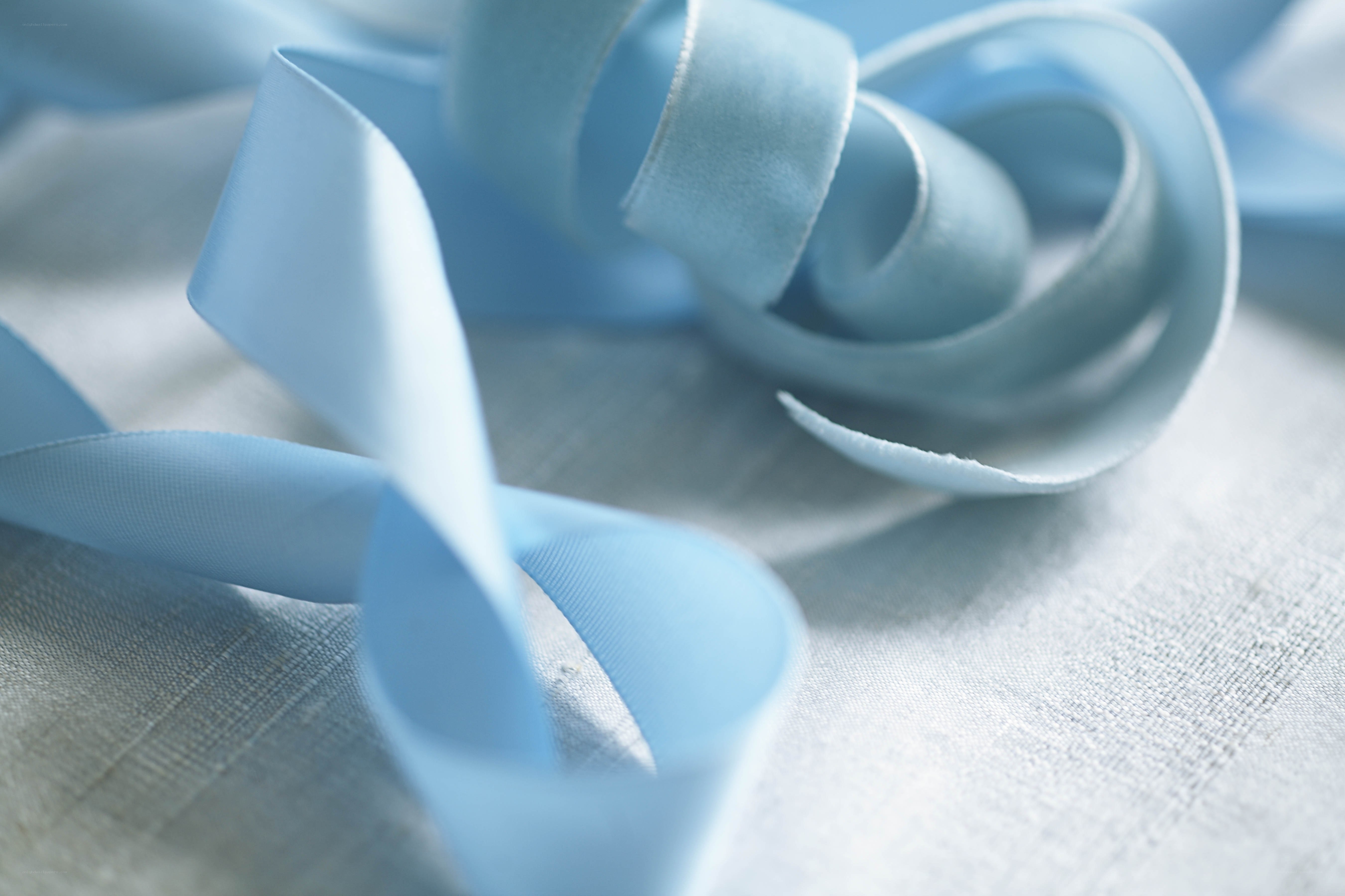 light blue ribbon on fabric