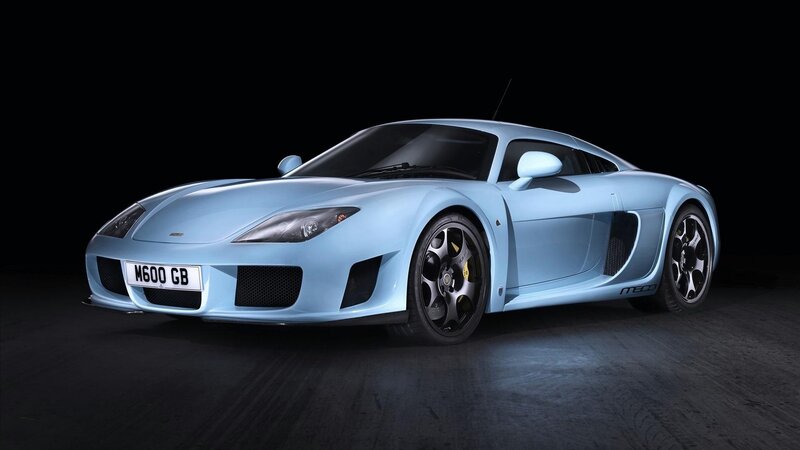 Light Blue Sports Car — Dramatic, Photograph, Black Wheels