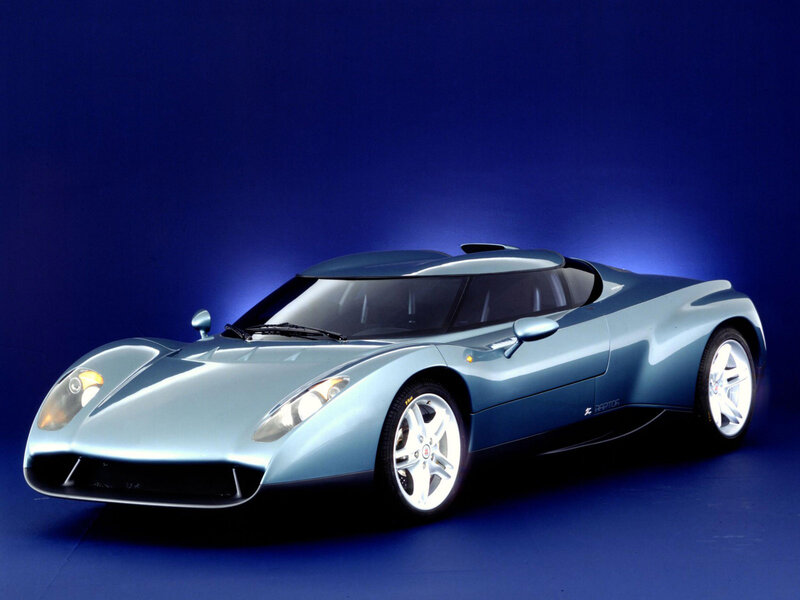 Light Blue Sports Car — Dramatic, Photograph, Blue Background