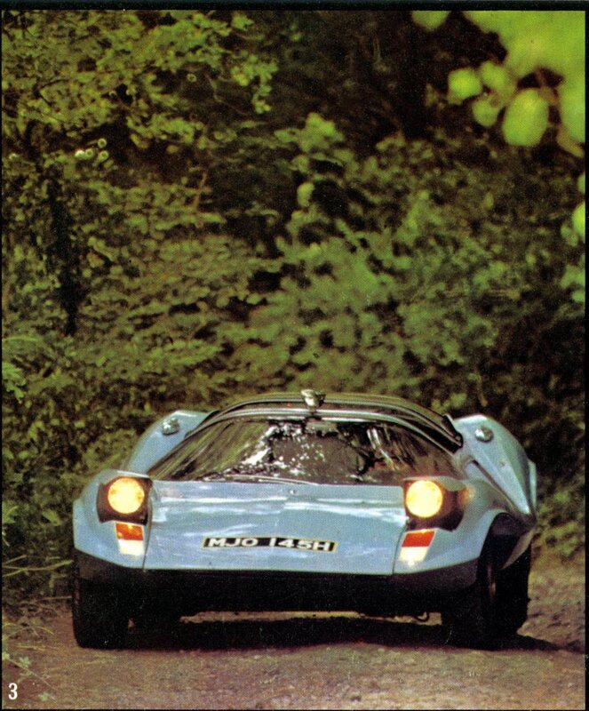 Light blue sports car on dirt road