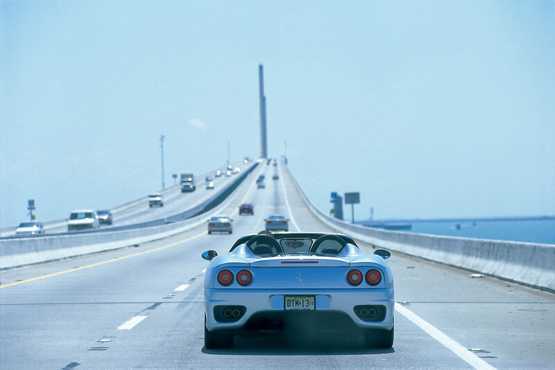 Light Blue Sports Car — Open