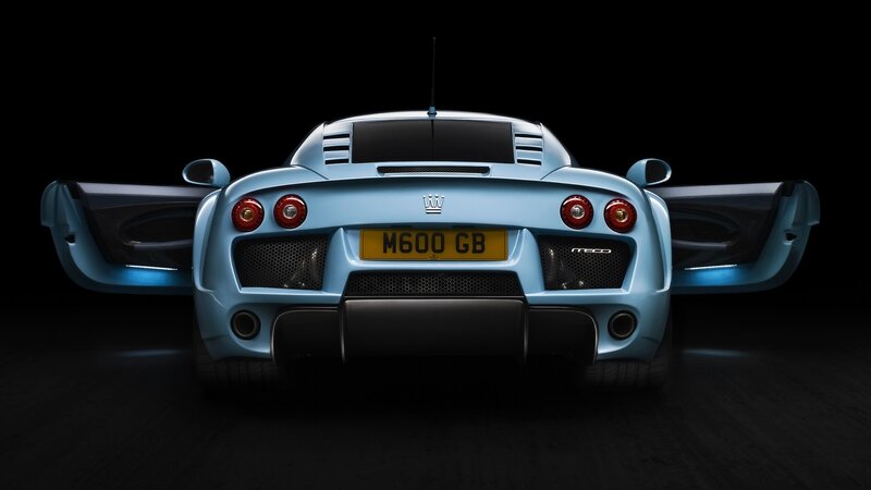 light blue sports car rear view