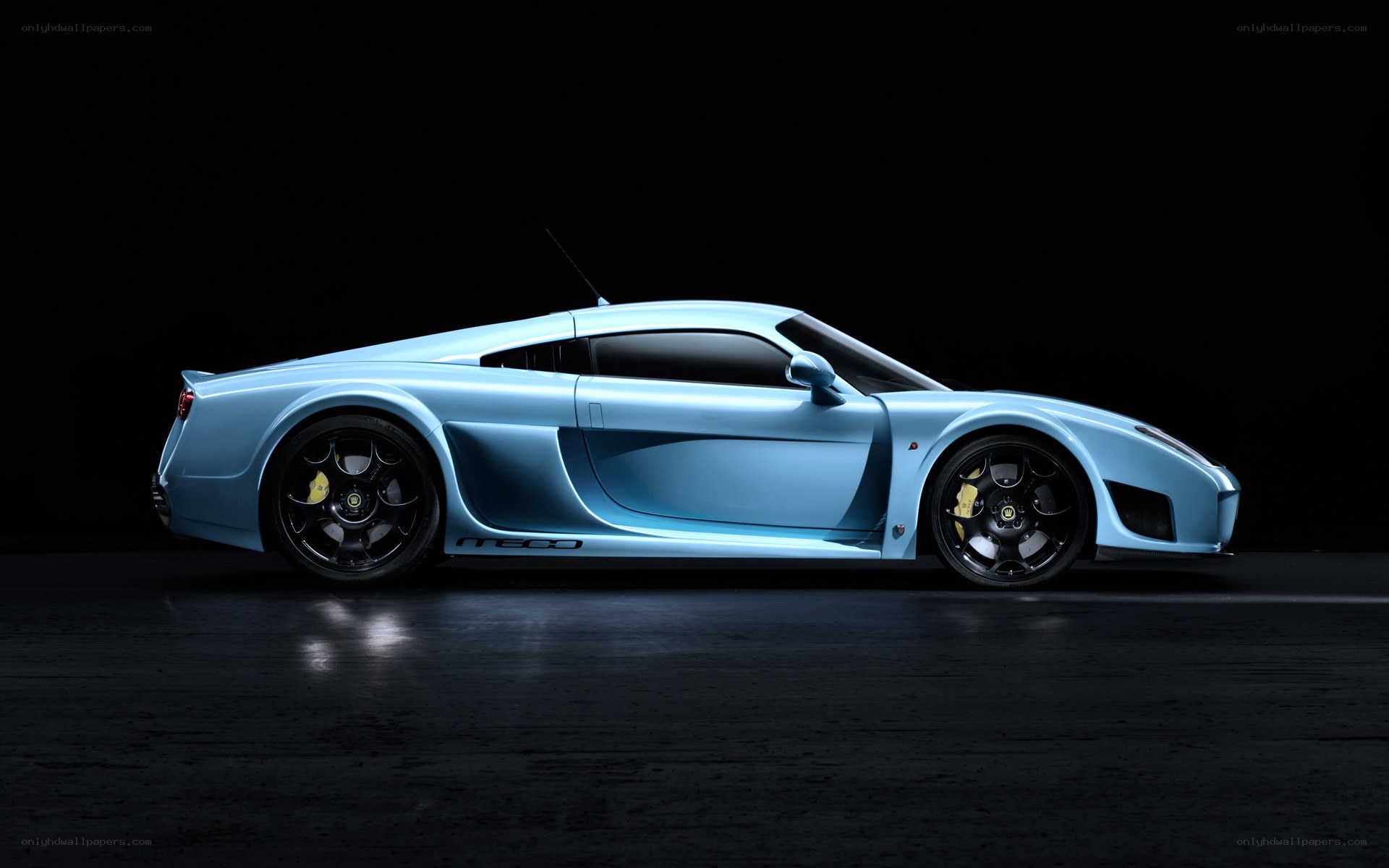 light blue sports car side view