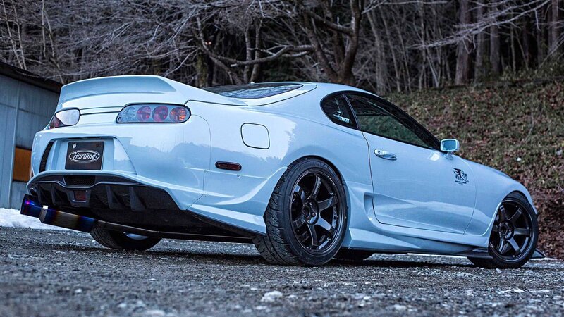 Light Blue Sports Car — White, Dramatic, Winter