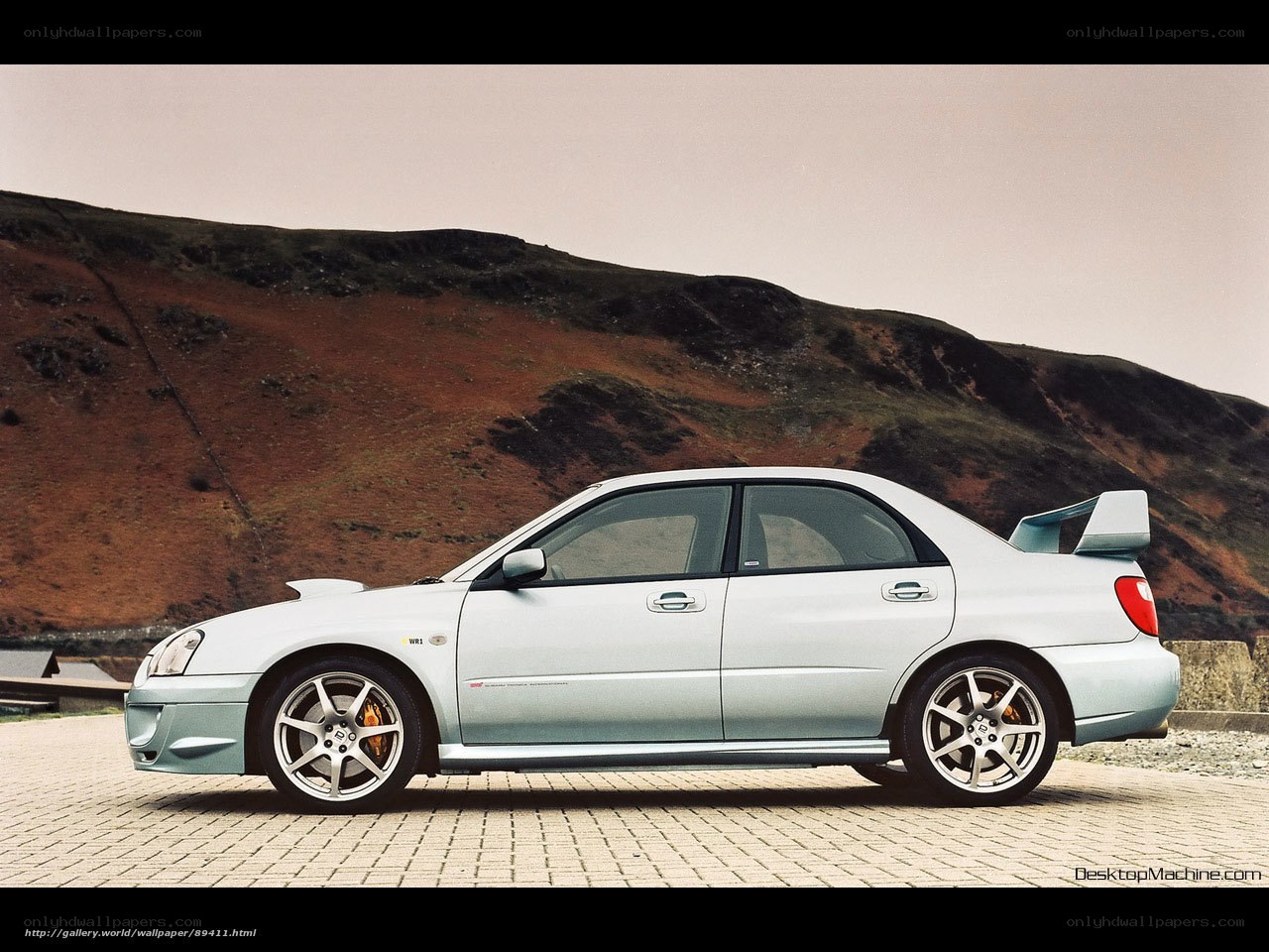 Light blue Subaru WRX sedan