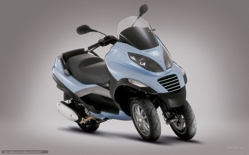 light blue three-wheeled scooter