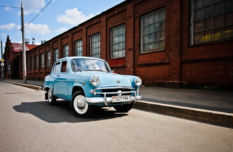 Light-blue Vintage Car — Blue, Calm, Afternoon, Photograph, Brick Building