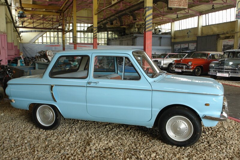 Light blue vintage car in museum