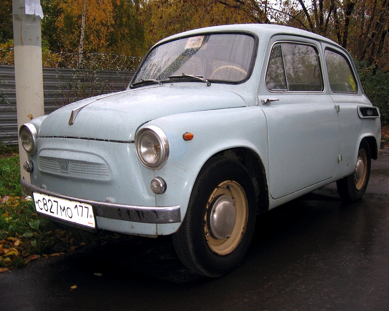 Light blue vintage car parked