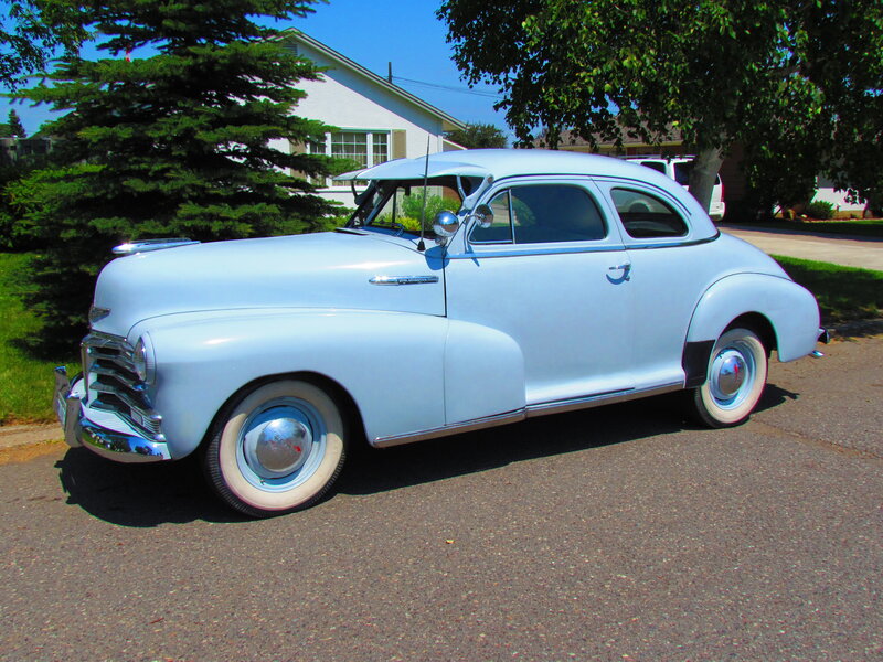 Light-blue Vintage Car — White