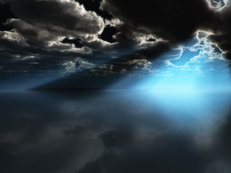 Light breaking through storm clouds