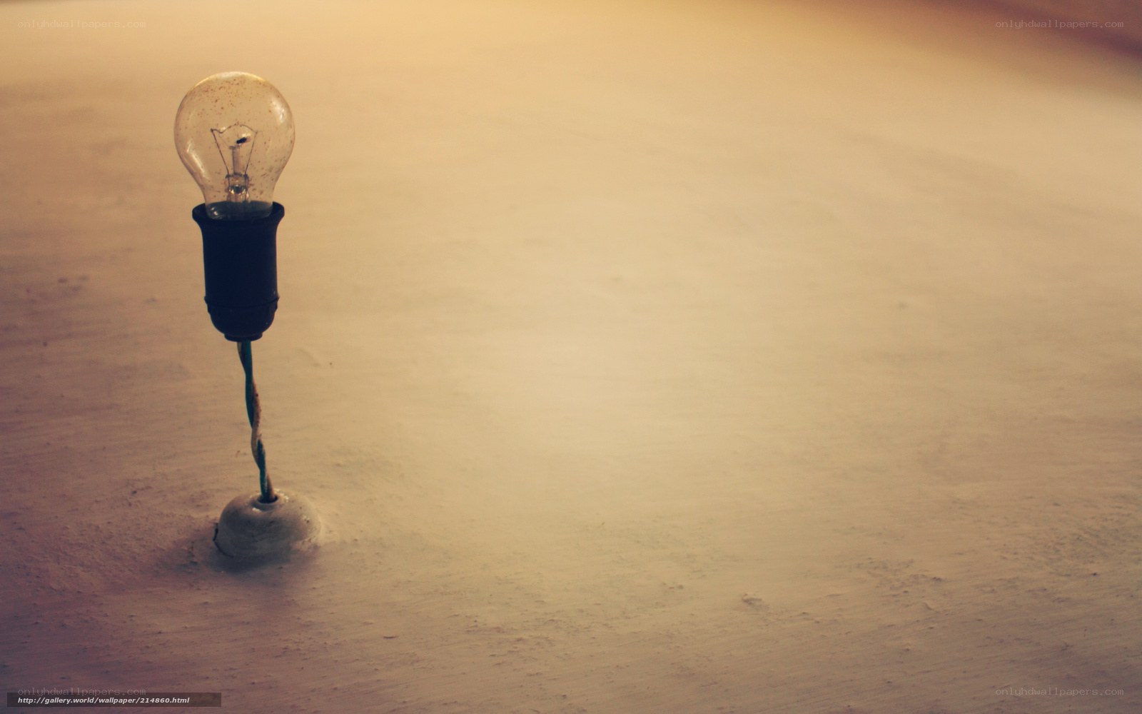 Light bulb in sand