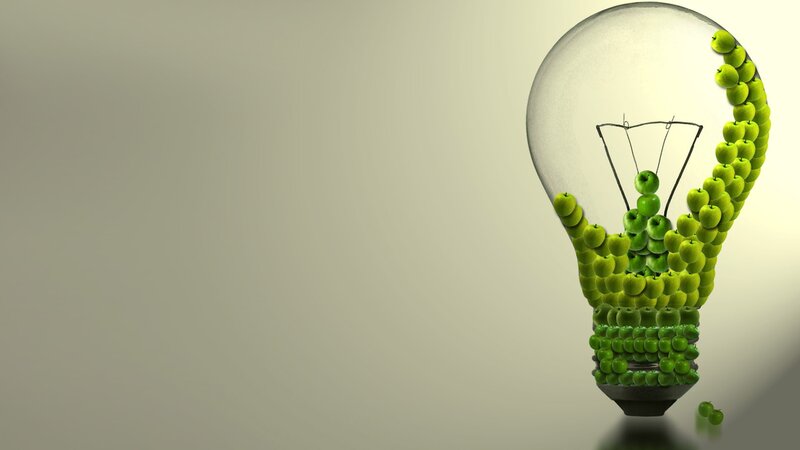 light bulb made of green apples