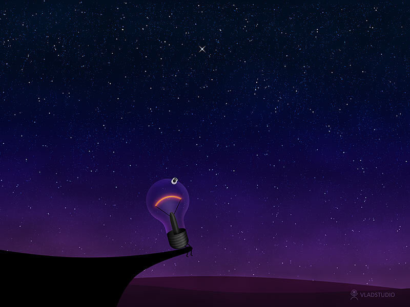 Light bulb on a cliff at night