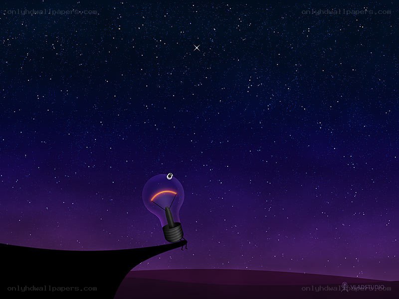 Light bulb on a cliff at night
