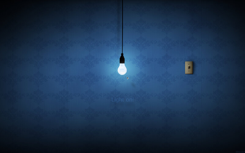 Light bulb on blue wallpaper