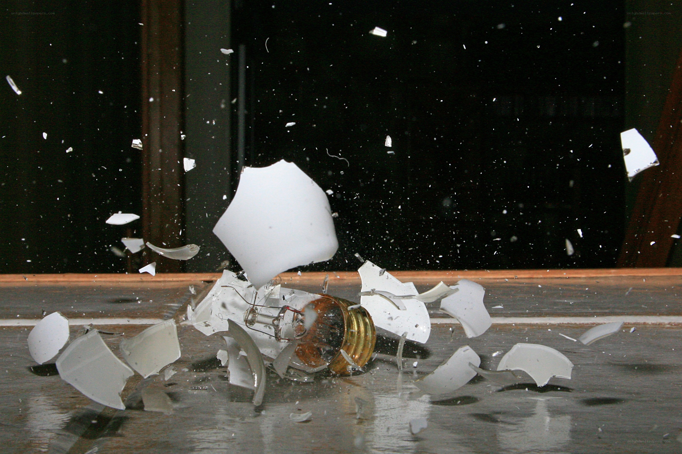 Light bulb shattering on floor