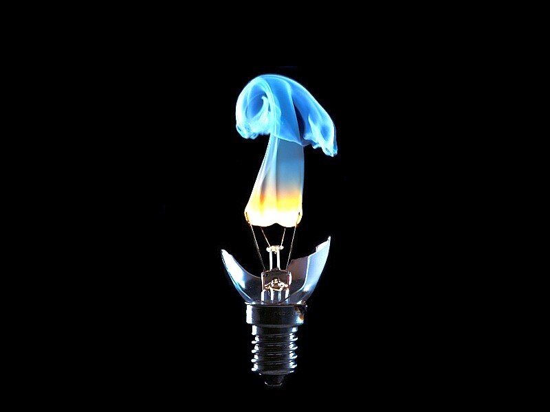 Light bulb with blue flame