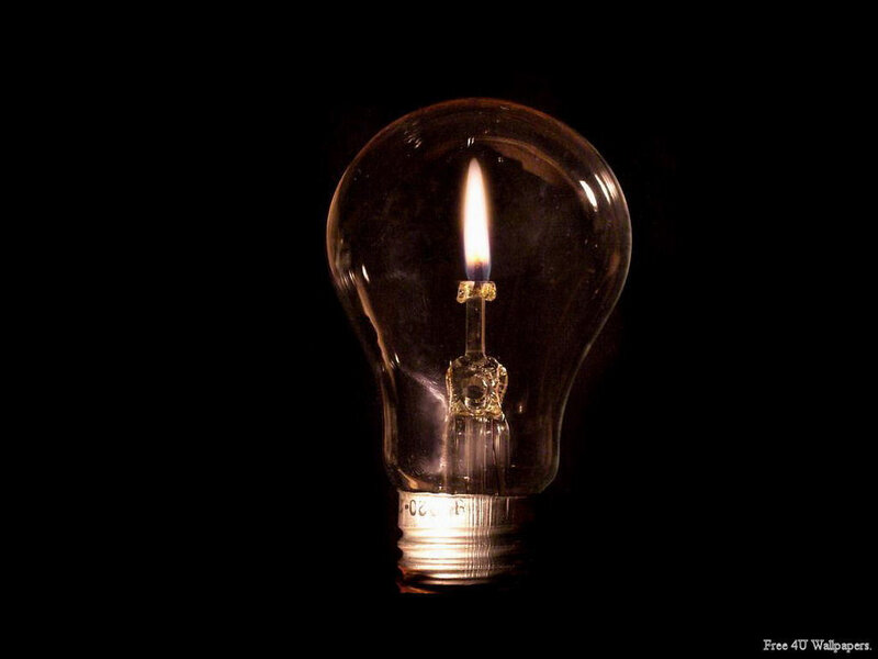 light bulb with candle flame