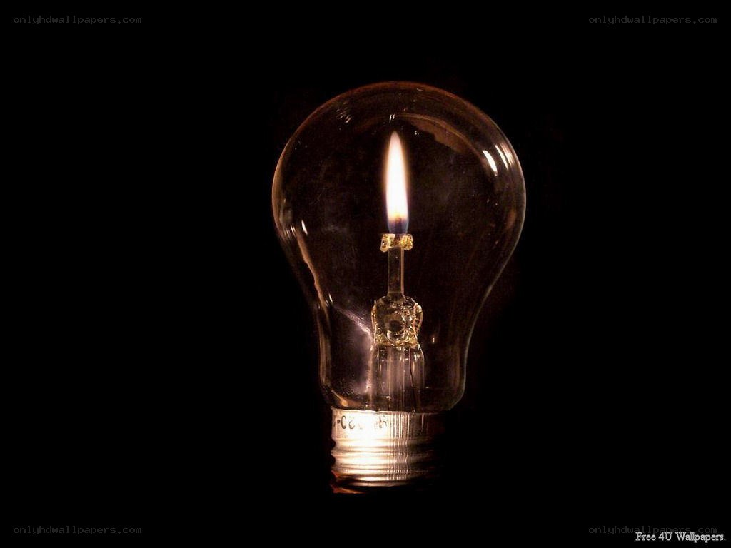 light bulb with candle flame