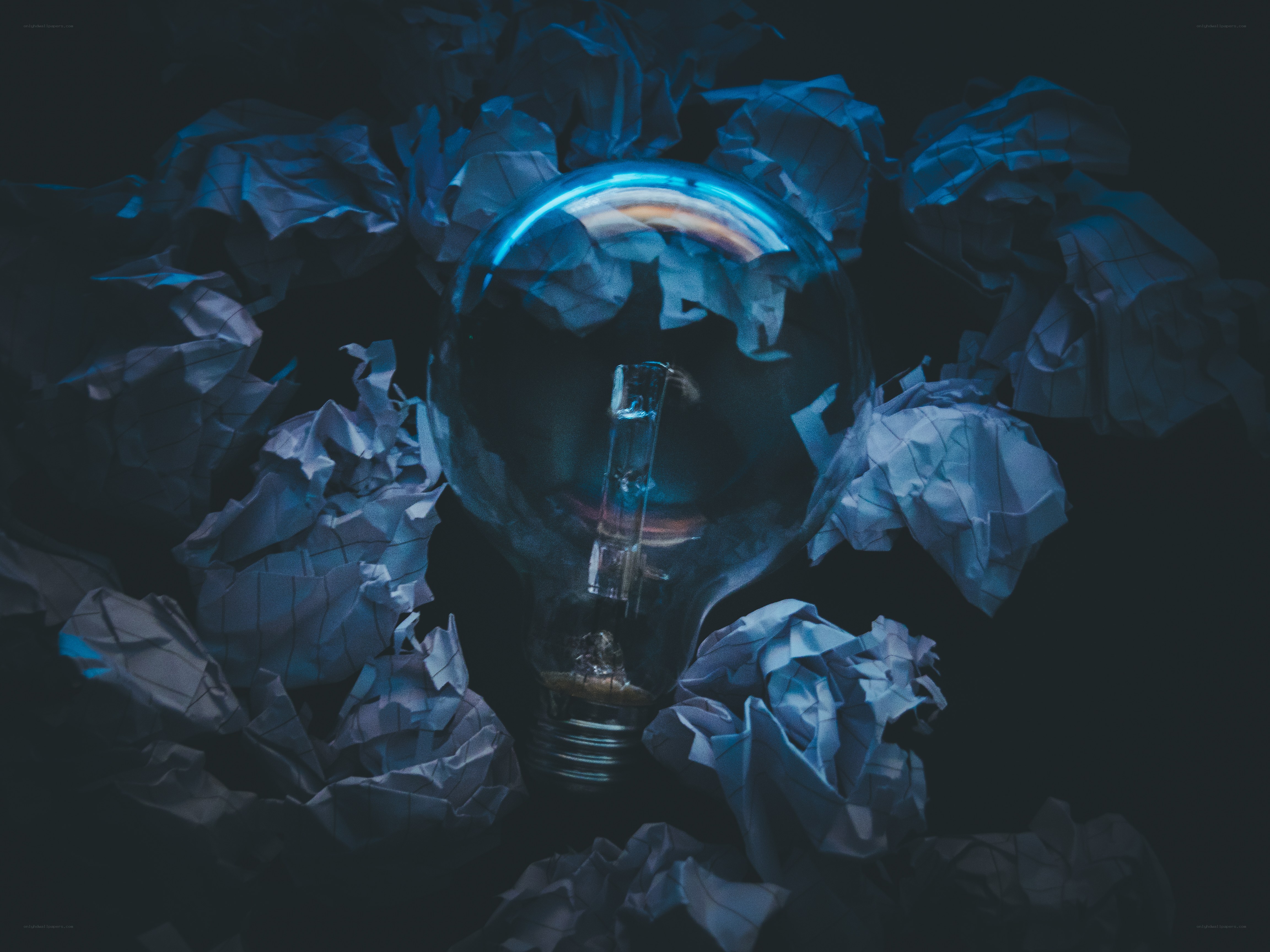 Light bulb with crumpled paper