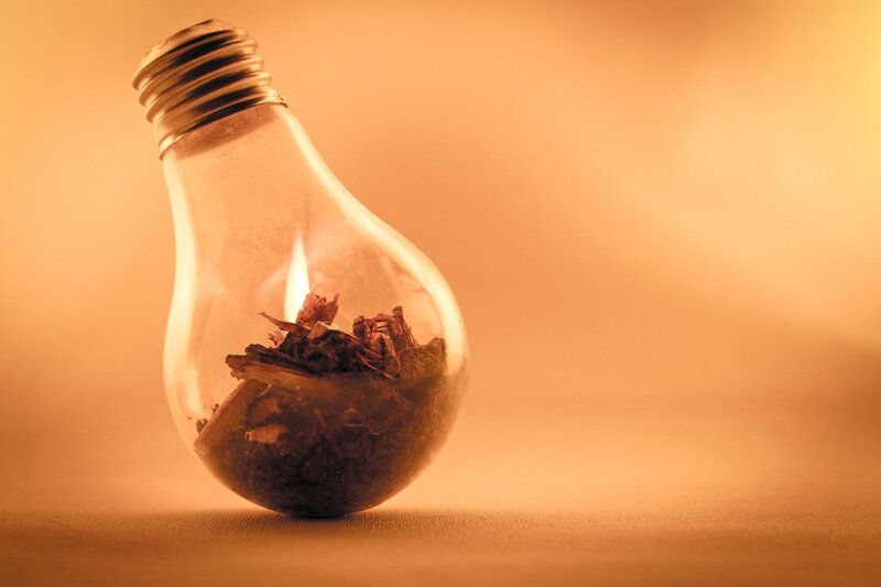 Light Bulb with Fire — Orange