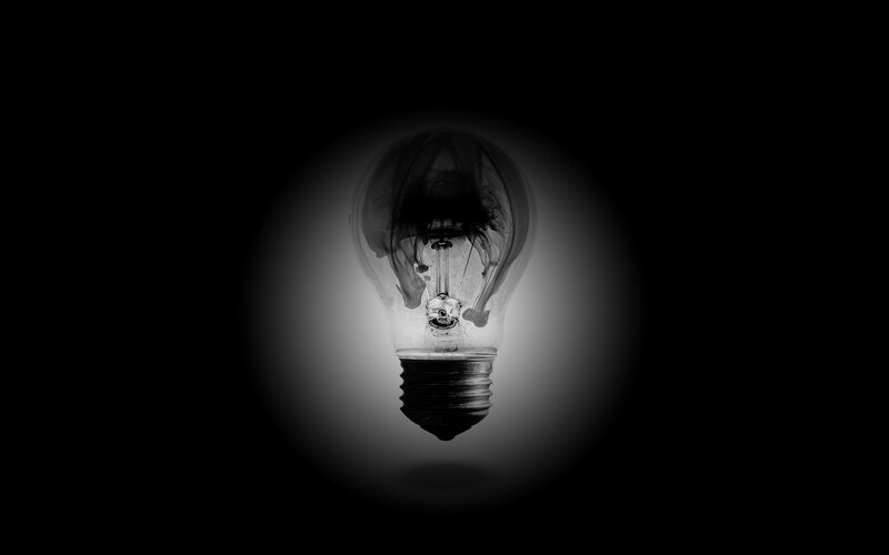 Light bulb with ink swirl