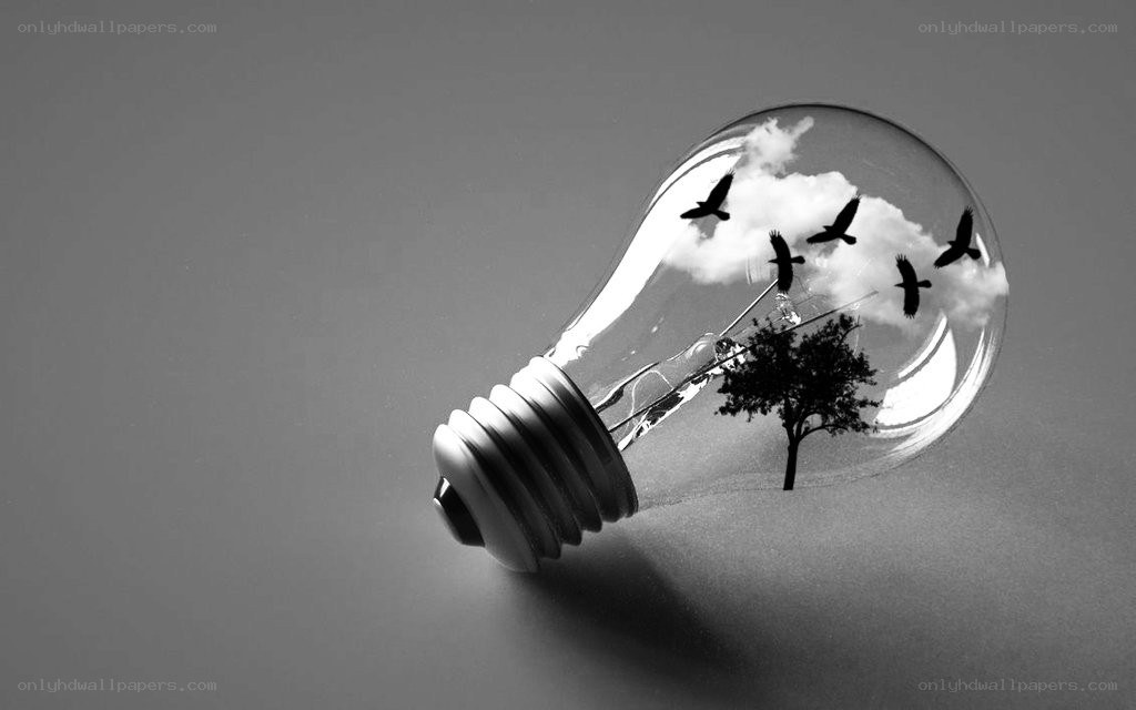 light bulb with nature scene
