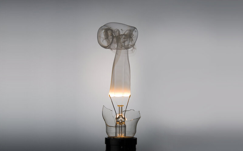 Light bulb with smoke
