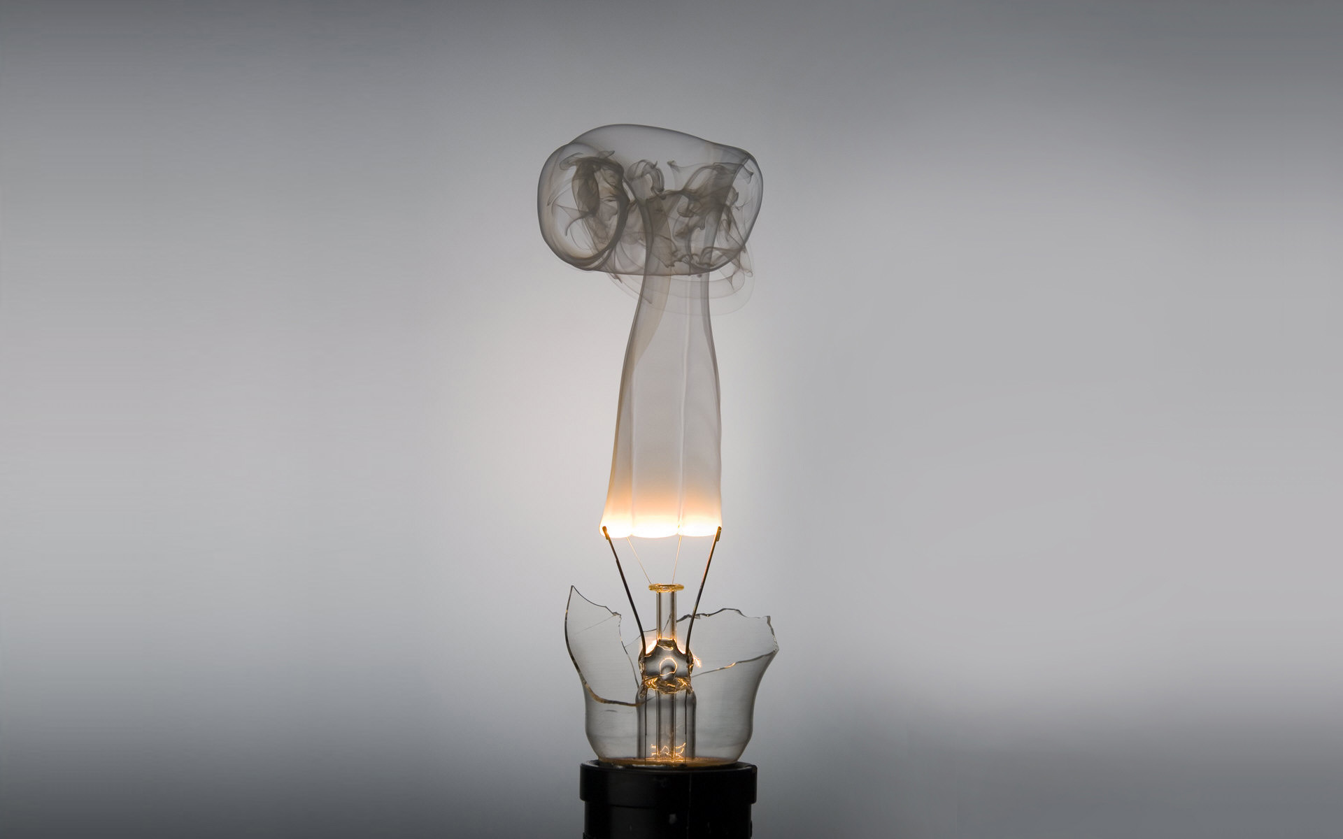 Light bulb with smoke