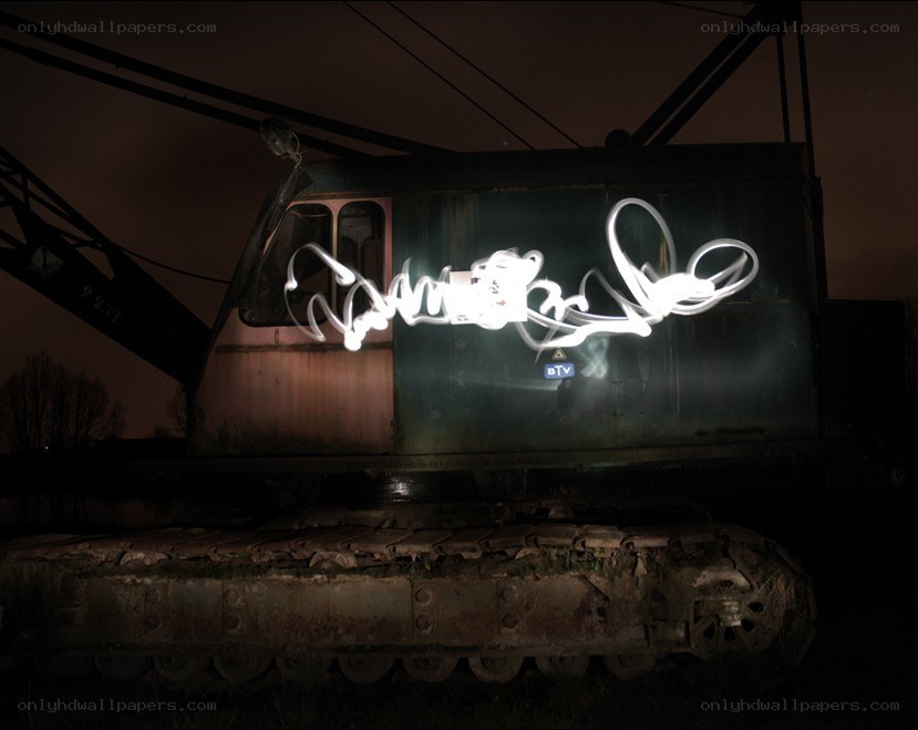 Light graffiti on a crane at night