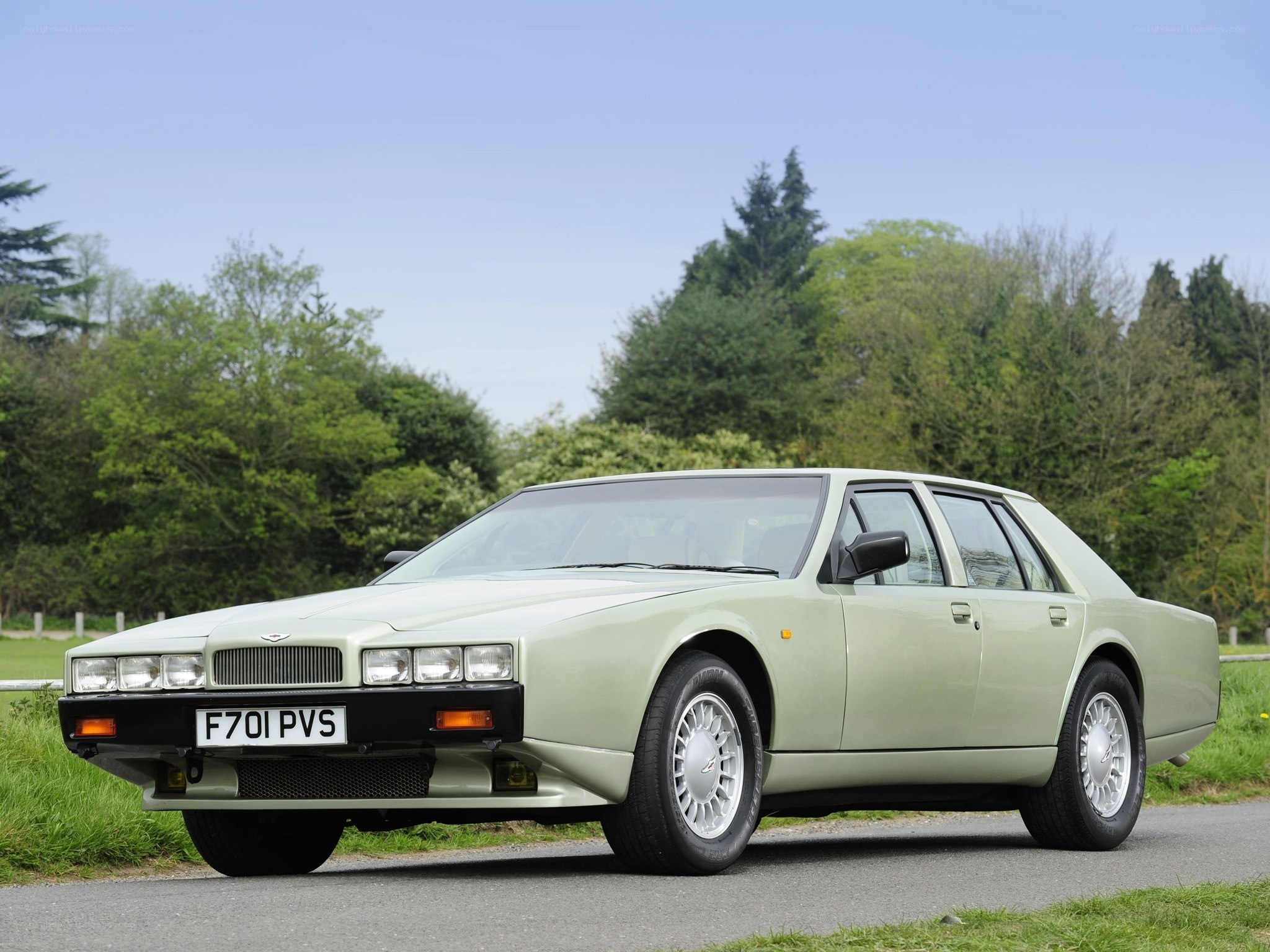 Light green Aston Martin sedan