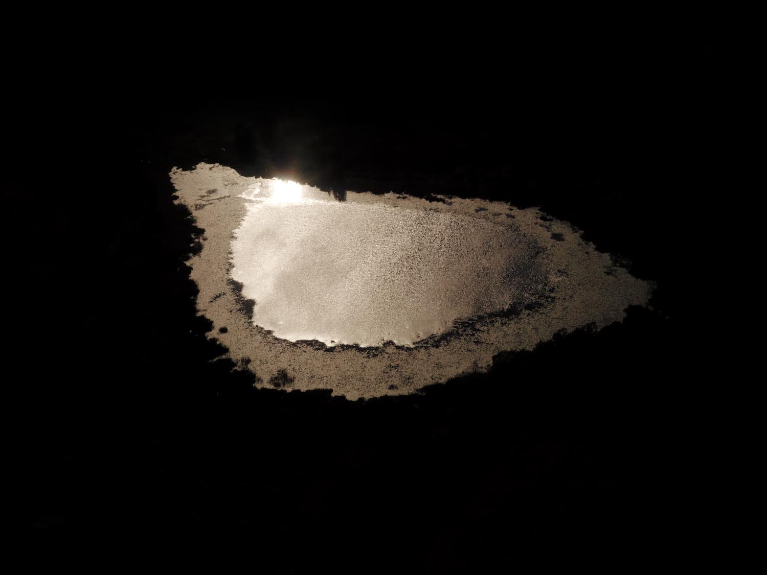 light on dark surface