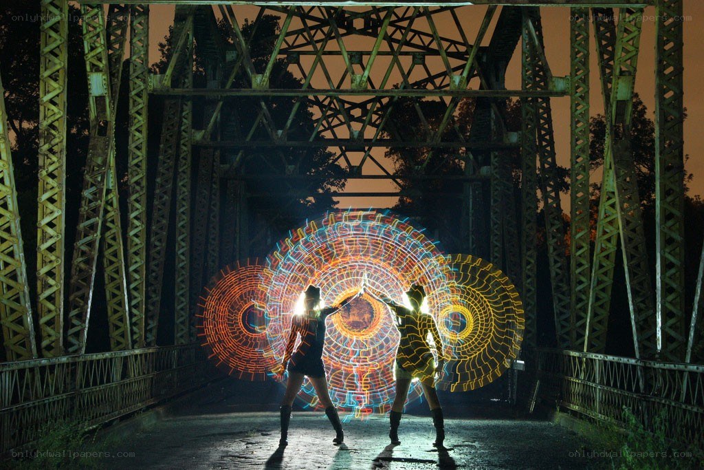 Light painting on a bridge at night