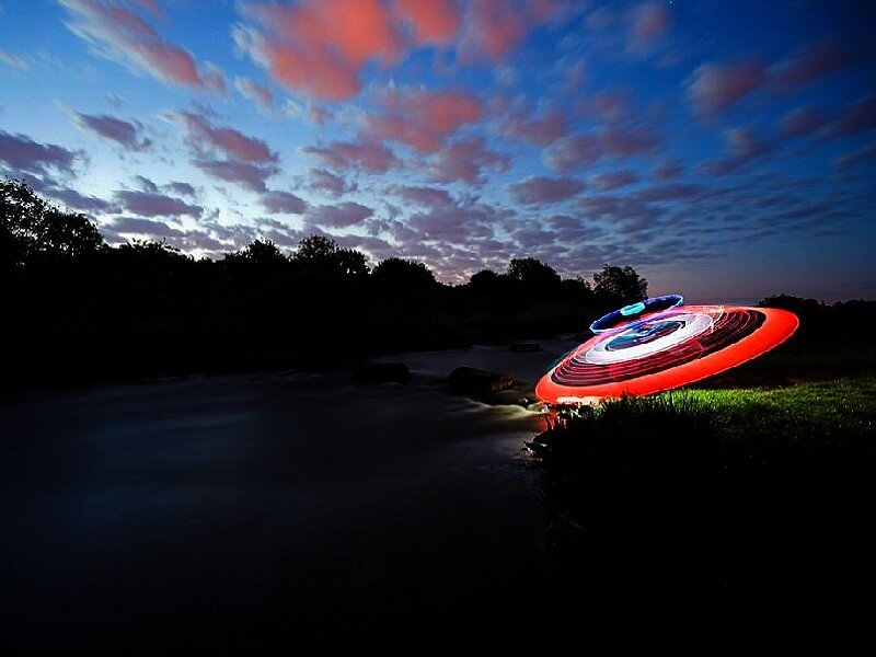 Light painting on a riverbank