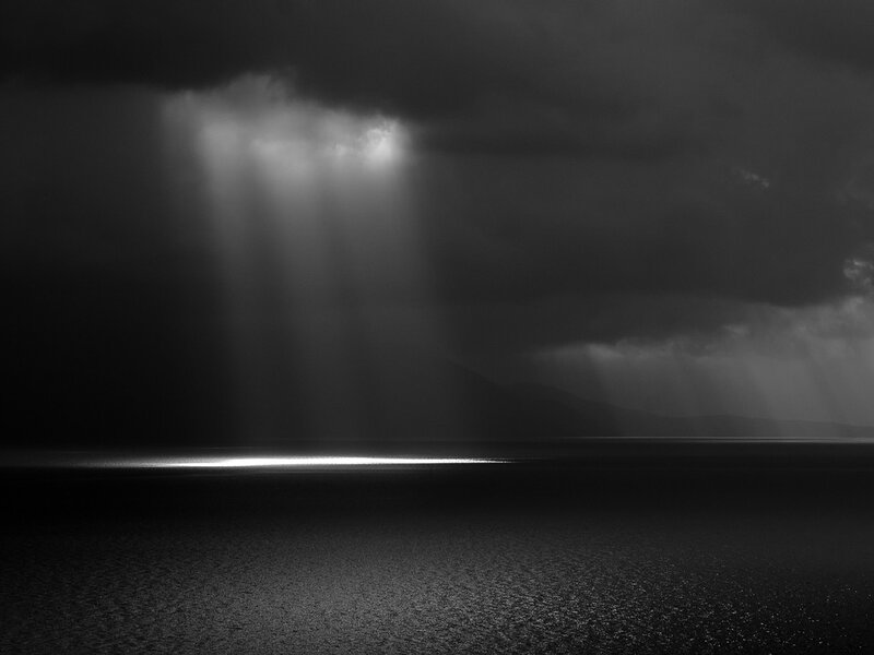 Light Rays over Water — Black, Dramatic