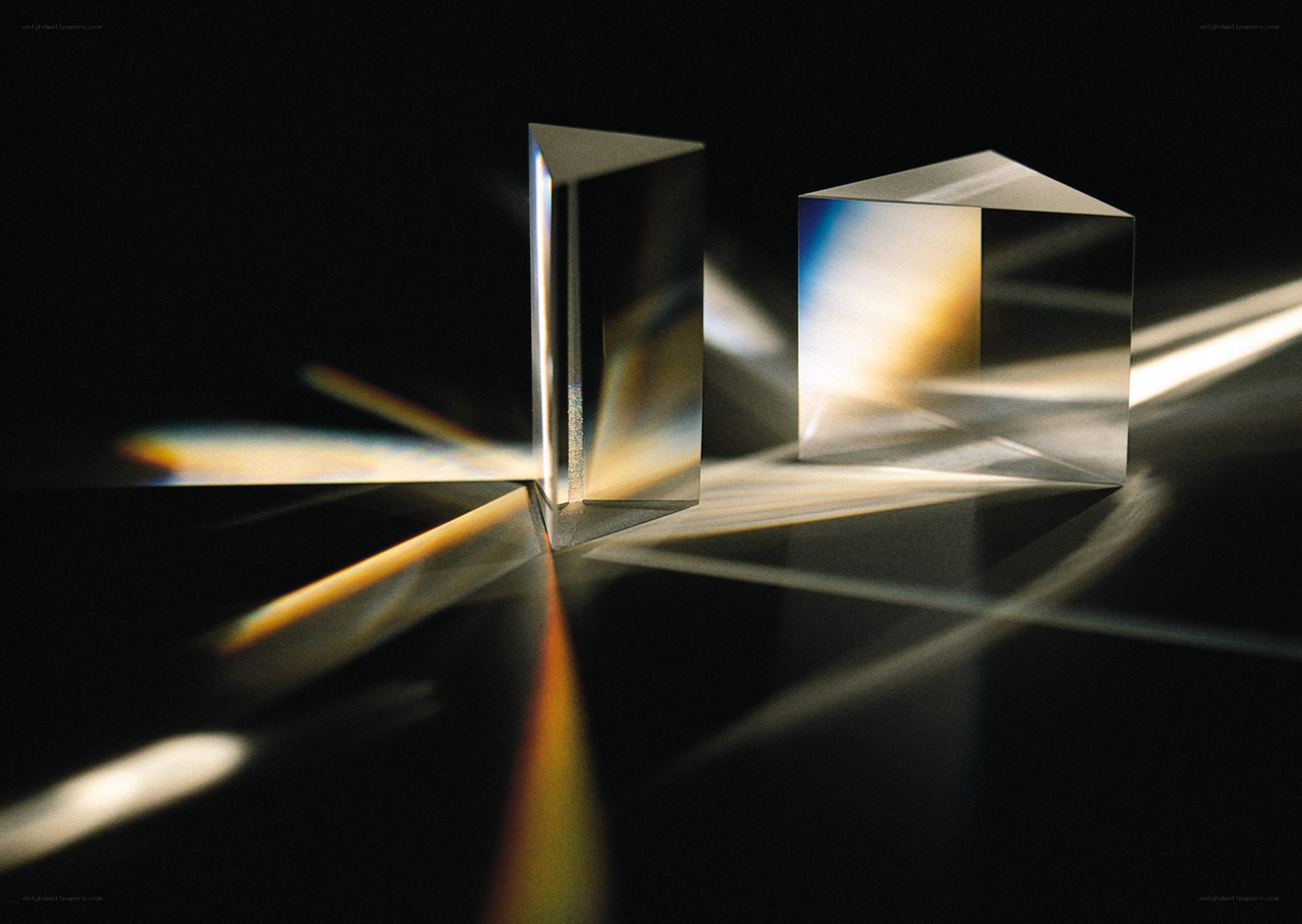 Light refraction through glass prisms