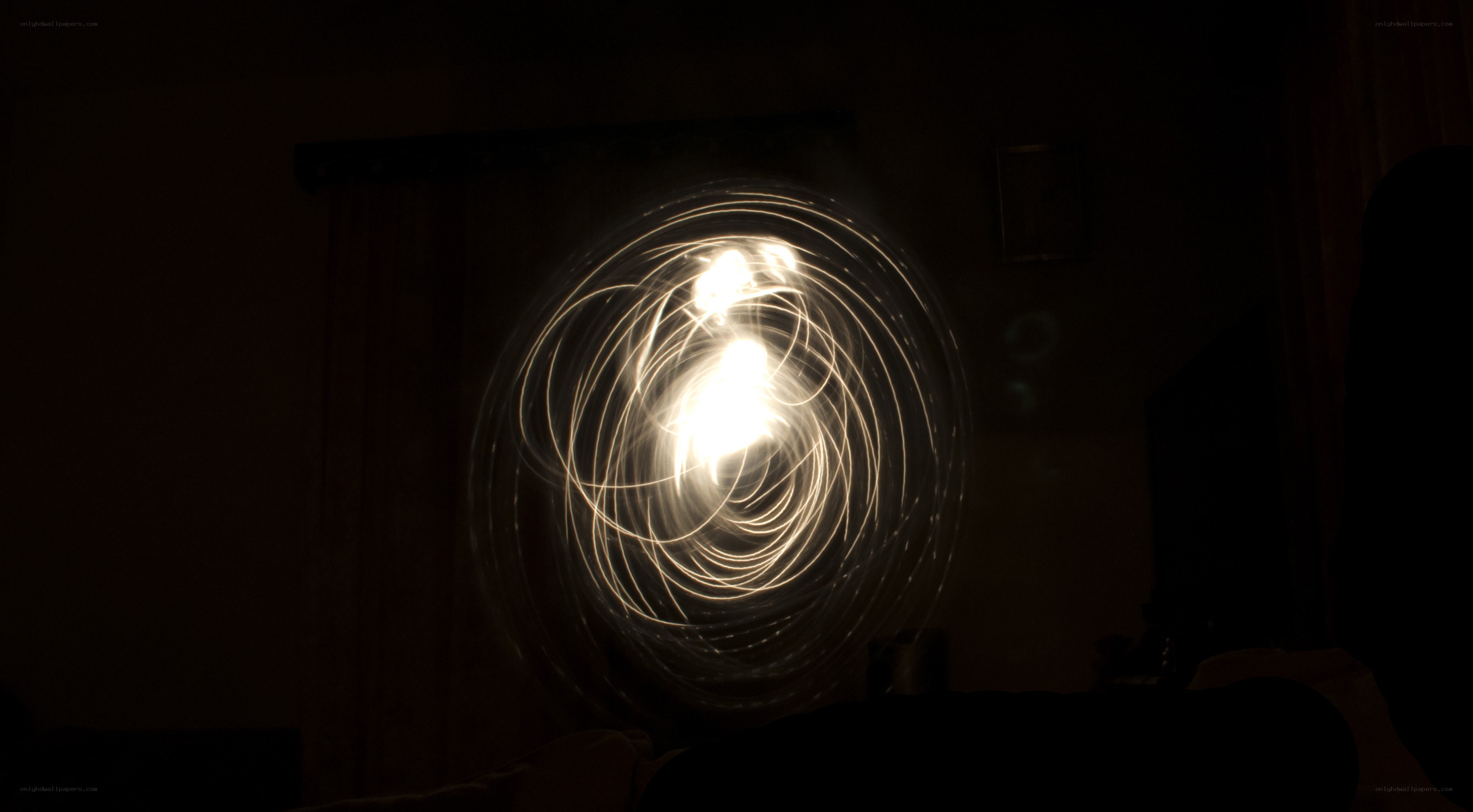 Light spiral in dark room