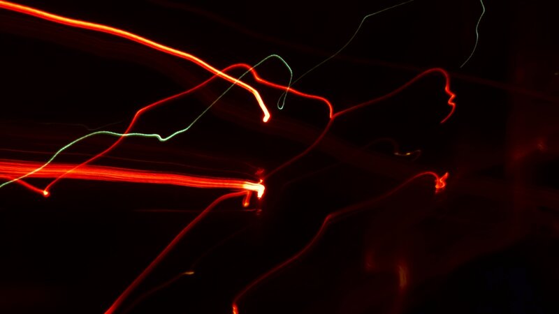 Light Trails in Darkness — Red