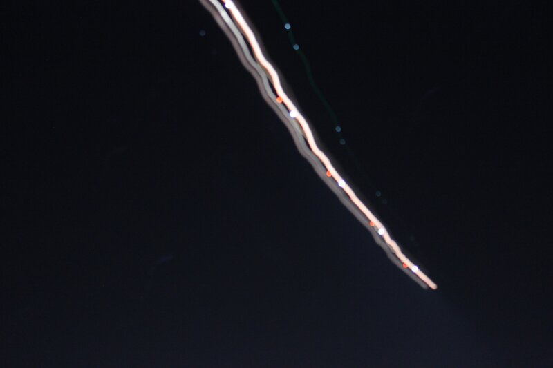 Light Trails in Night Sky — Black