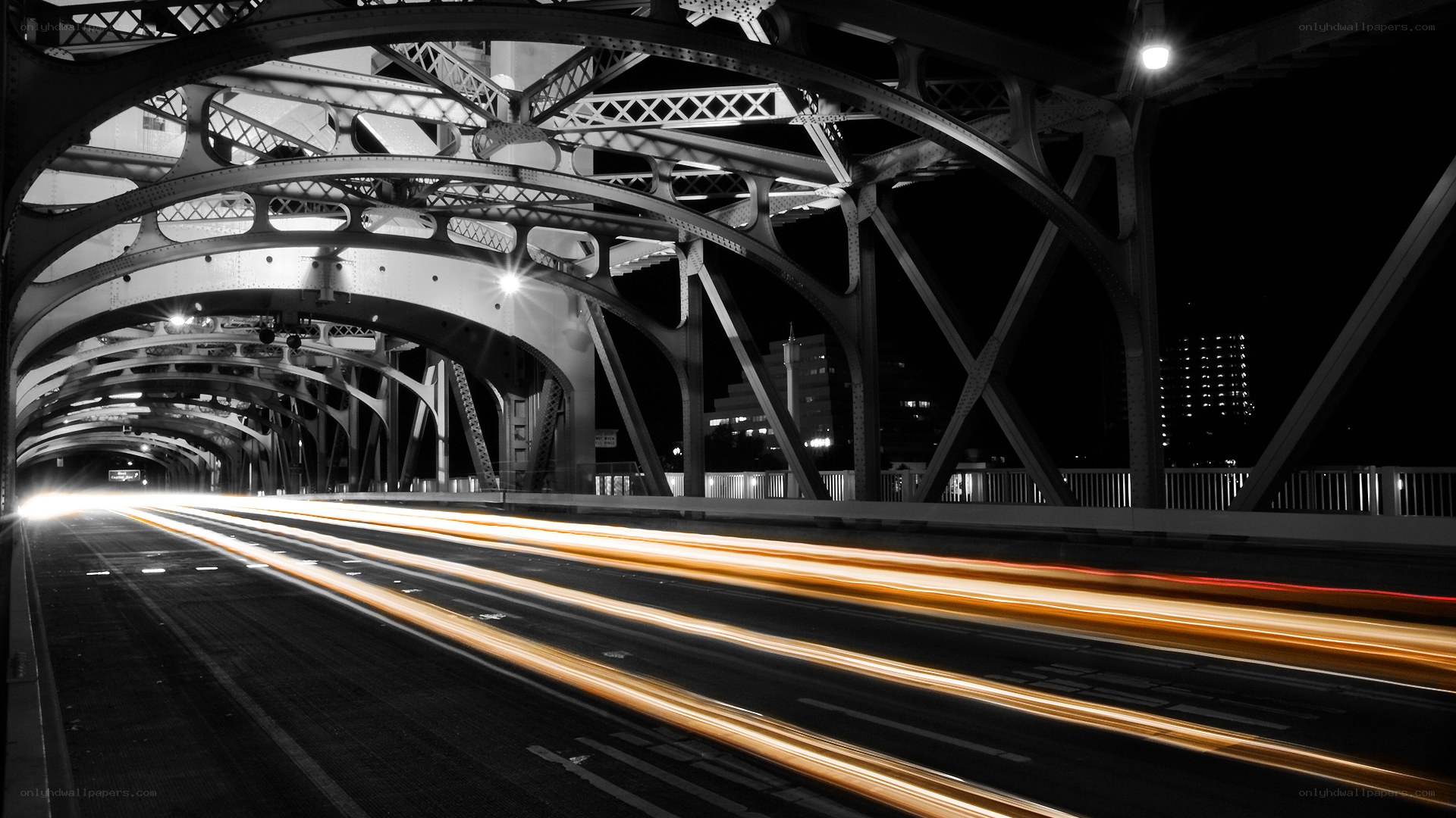 Light trails on a bridge at night