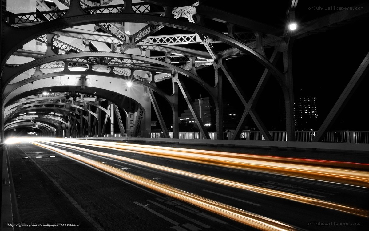 Light trails on a bridge at night