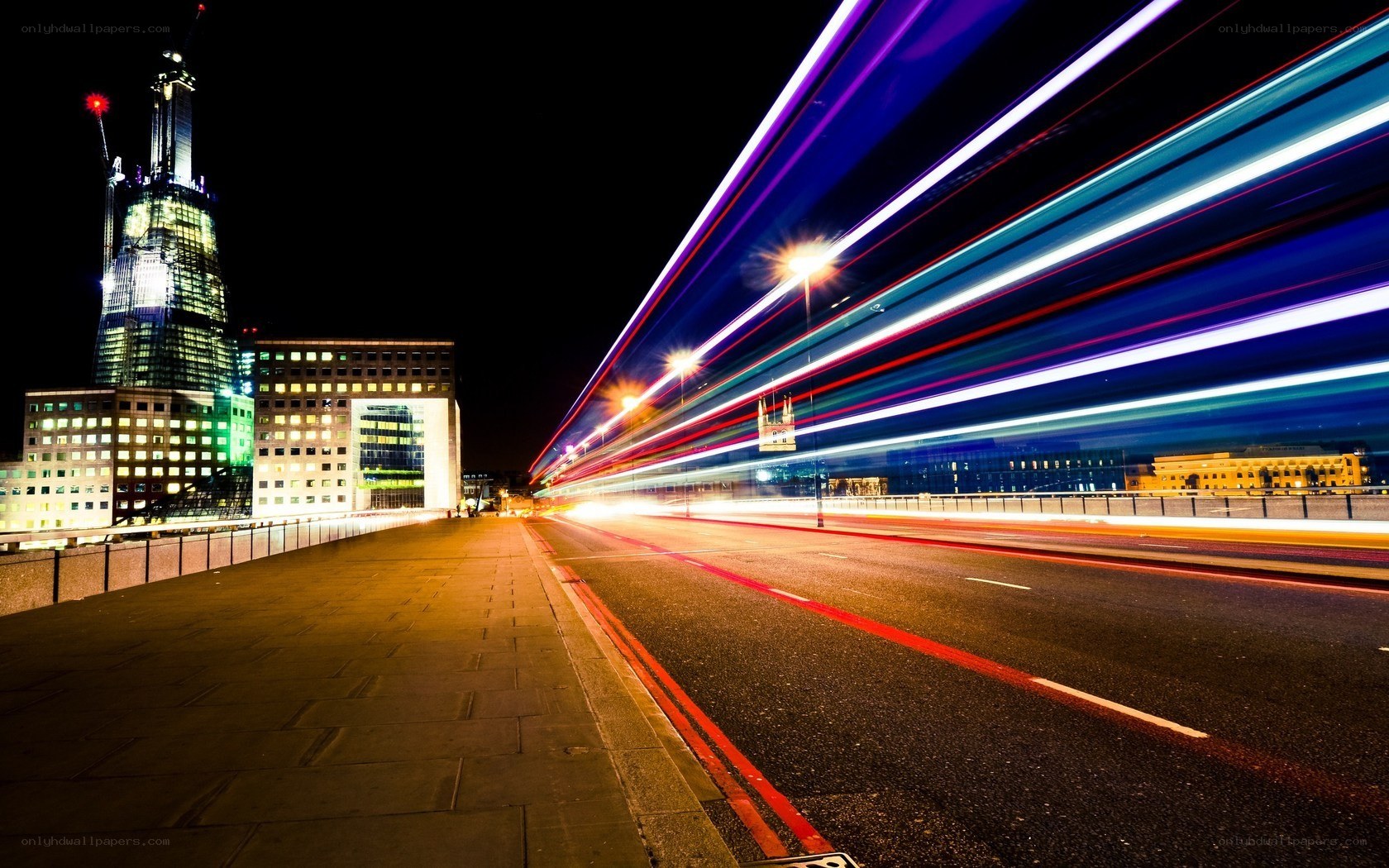 Light trails on a city bridge