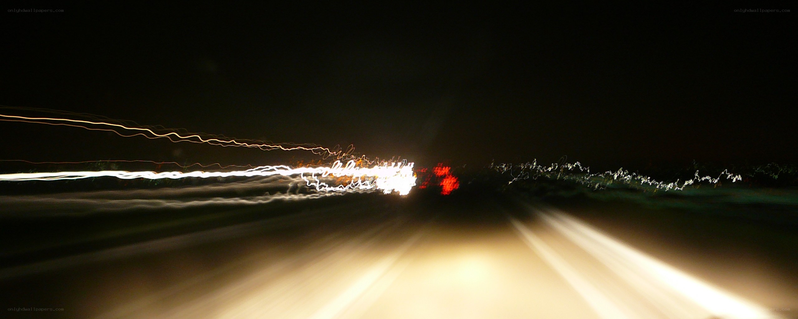 light trails on a dark road